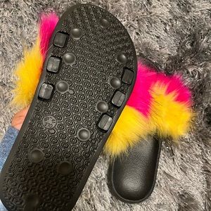 Pink and yellow fuzzy slides